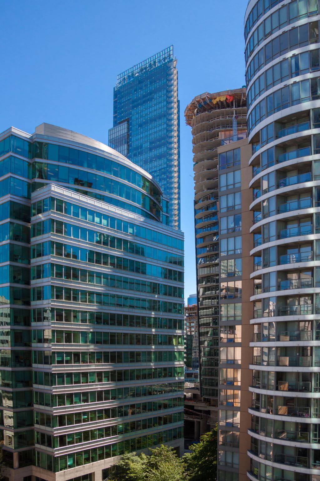Tall office tower representing Canadian business operations