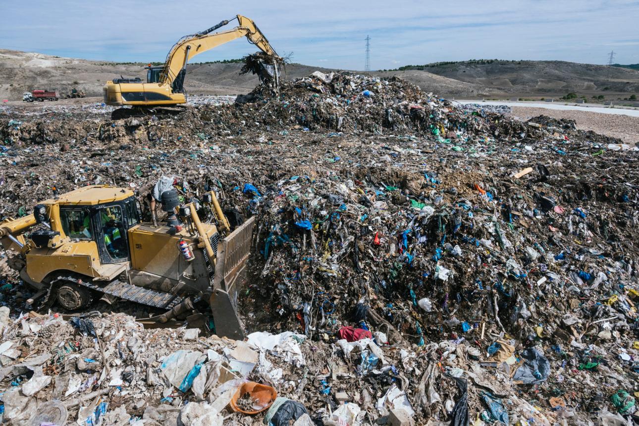 Construction and demolition scrap yard with heavy equipment